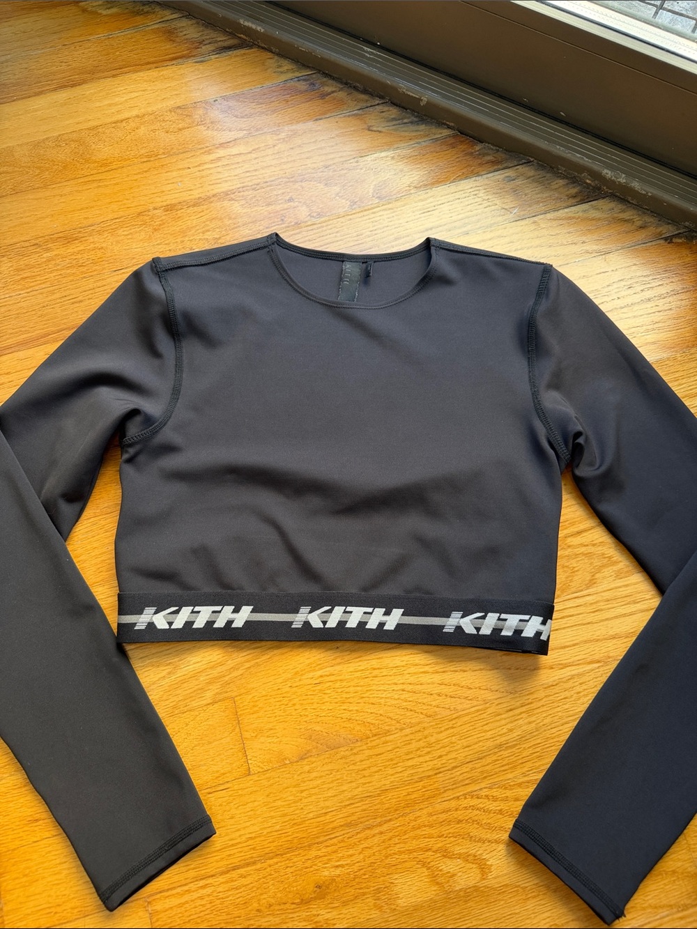 Kith Black Long Sleeve Cropped Top with Logo Hem